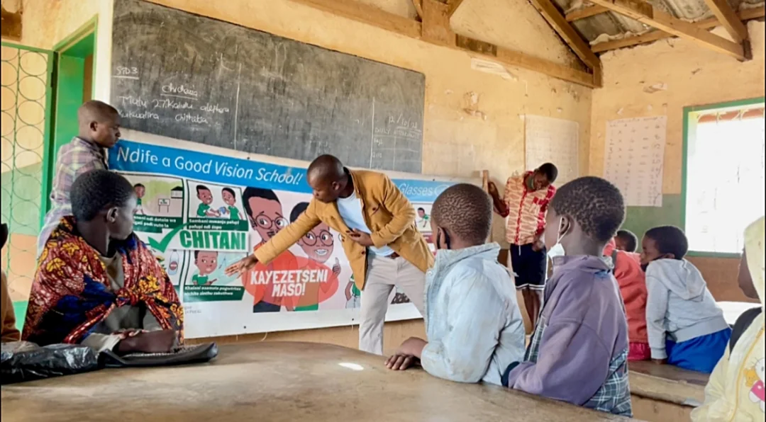 African children in a rural school setting, representing the future generation benefiting from eye health education